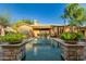 Stunning pool view with reflection of house at 25410 N 46Th Ln, Phoenix, AZ 85083