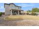 Two-story home with covered patio and grassy yard at 2924 N Taylor Ln, Casa Grande, AZ 85122