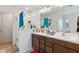 Main bathroom with double vanity and walk-in shower at 2924 N Taylor Ln, Casa Grande, AZ 85122