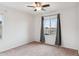 Bright bedroom with window and neutral carpet at 2924 N Taylor Ln, Casa Grande, AZ 85122