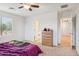 Bedroom with double door to bathroom and dresser at 2924 N Taylor Ln, Casa Grande, AZ 85122