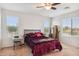 Bright bedroom with large windows and plush bedding at 2924 N Taylor Ln, Casa Grande, AZ 85122