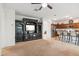 Open living room features built-in shelving and flows into kitchen at 2924 N Taylor Ln, Casa Grande, AZ 85122