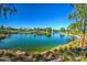 Serene community lake with scenic walking paths at 3393 N San Marin Dr, Florence, AZ 85132