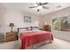 Main bedroom with a king-size bed and neutral decor at 3630 N French Pl, Casa Grande, AZ 85122