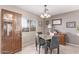 Dining area with wooden furniture and tile floors at 3630 N French Pl, Casa Grande, AZ 85122