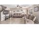 Spacious living room with tile floors and neutral colors at 3630 N French Pl, Casa Grande, AZ 85122