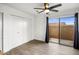 Bedroom with sliding glass doors to patio, and walk-in closet at 408 W Pontiac Dr # 5, Phoenix, AZ 85027