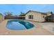 Backyard with a pool, covered patio, and privacy fence at 4238 W Krall St, Phoenix, AZ 85019