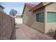 Side yard with a brick pathway and gravel at 4251 W Jasper Dr, Chandler, AZ 85226