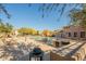 Community pool with BBQ grills and seating at 4728 E Waterman St # 101, Gilbert, AZ 85297