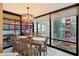 Bright dining room with large windows and seating for six at 4808 N 24Th St # 621, Phoenix, AZ 85016