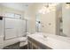 Bathroom with a shower/tub combo, single vanity, and tile floor at 5217 S Crested Saguaro Ln, Gold Canyon, AZ 85118