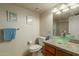 Bathroom with toilet, glass vessel sink, and shower at 8651 E Royal Palm Rd # 105, Scottsdale, AZ 85258