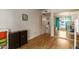 bedroom with mirrored closet and access to another room at 8651 E Royal Palm Rd # 105, Scottsdale, AZ 85258