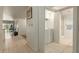 Convenient laundry area with washer and dryer in hallway at 8651 E Royal Palm Rd # 105, Scottsdale, AZ 85258