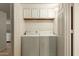 Laundry closet with washer and dryer at 8651 E Royal Palm Rd # 105, Scottsdale, AZ 85258