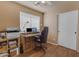 Home office space featuring a desk, chair, printer, and storage at 10232 E Fortuna Ave, Gold Canyon, AZ 85118