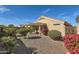 Spacious backyard with covered patio and desert landscaping at 11335 W Madisen Ellise Dr, Surprise, AZ 85378