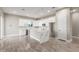 Modern kitchen with white shaker cabinets and large island at 1207 N 362Nd Ave, Tonopah, AZ 85354