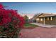 Blooming bougainvillea and a covered patio at 1301 E Kaler Dr, Phoenix, AZ 85020