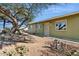 House exterior with large tree and gravel landscaping at 1301 E Kaler Dr, Phoenix, AZ 85020