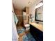 Bathroom with walk-in shower, tiled walls, and granite vanity at 14821 N 51St Dr, Glendale, AZ 85306