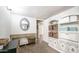 Clean bathroom with storage and a large mirror at 14821 N 51St Dr, Glendale, AZ 85306