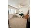 Bright bedroom with double bed, window, and TV at 14821 N 51St Dr, Glendale, AZ 85306
