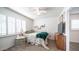 Charming bedroom with a teal blanket and wood dresser at 14821 N 51St Dr, Glendale, AZ 85306