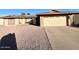 Ranch style home with driveway and yard at 14821 N 51St Dr, Glendale, AZ 85306