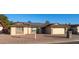 Single-story home with solar panels, attached garage, and desert landscaping at 14821 N 51St Dr, Glendale, AZ 85306