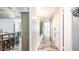 Bright hallway with wood-look flooring and access to bedrooms at 14821 N 51St Dr, Glendale, AZ 85306