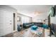 Spacious living room with wood-look floors and lots of natural light at 14821 N 51St Dr, Glendale, AZ 85306