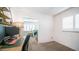 Home office with a desk and view into bedroom at 14821 N 51St Dr, Glendale, AZ 85306