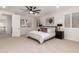 Well-lit bedroom with ample space and neutral color palette at 15139 W Pierson St, Goodyear, AZ 85395