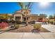 Two-story house with landscaped yard and a covered porch at 15139 W Pierson St, Goodyear, AZ 85395