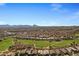 Expansive view of community, golf course, and mountain backdrop at 15816 E Brittlebush Ln, Fountain Hills, AZ 85268