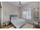 Bright bedroom with wood floors and ceiling fan at 15816 E Brittlebush Ln, Fountain Hills, AZ 85268