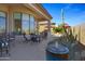 Charming patio with a water fountain and cactus plants, creating a serene ambiance at 15816 E Brittlebush Ln, Fountain Hills, AZ 85268