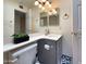 Clean bathroom with gray vanity and corner sink at 18802 N 44Th Pl, Phoenix, AZ 85050