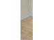 Bright bedroom with light wood-look flooring and white walls at 18802 N 44Th Pl, Phoenix, AZ 85050