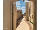 Private gated entryway with a paved walkway leading to the house at 18802 N 44Th Pl, Phoenix, AZ 85050