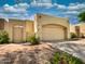 Front view of the house with a garage and walkway at 18802 N 44Th Pl, Phoenix, AZ 85050
