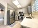 Modern kitchen featuring stainless steel appliances and quartz countertops at 18802 N 44Th Pl, Phoenix, AZ 85050