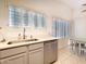 Bright kitchen with stainless steel dishwasher and sink at 18802 N 44Th Pl, Phoenix, AZ 85050