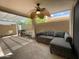Covered patio with seating area and ceiling fan at 18802 N 44Th Pl, Phoenix, AZ 85050