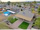 Property with backyard, covered patio, and pool at 19431 N Central Ave, Phoenix, AZ 85024