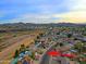 Aerial view of house, neighborhood, and surrounding landscape at 19431 N Central Ave, Phoenix, AZ 85024