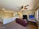 Loft game room with a couch, basketball game, and TV at 2264 S Sorrelle --, Mesa, AZ 85209